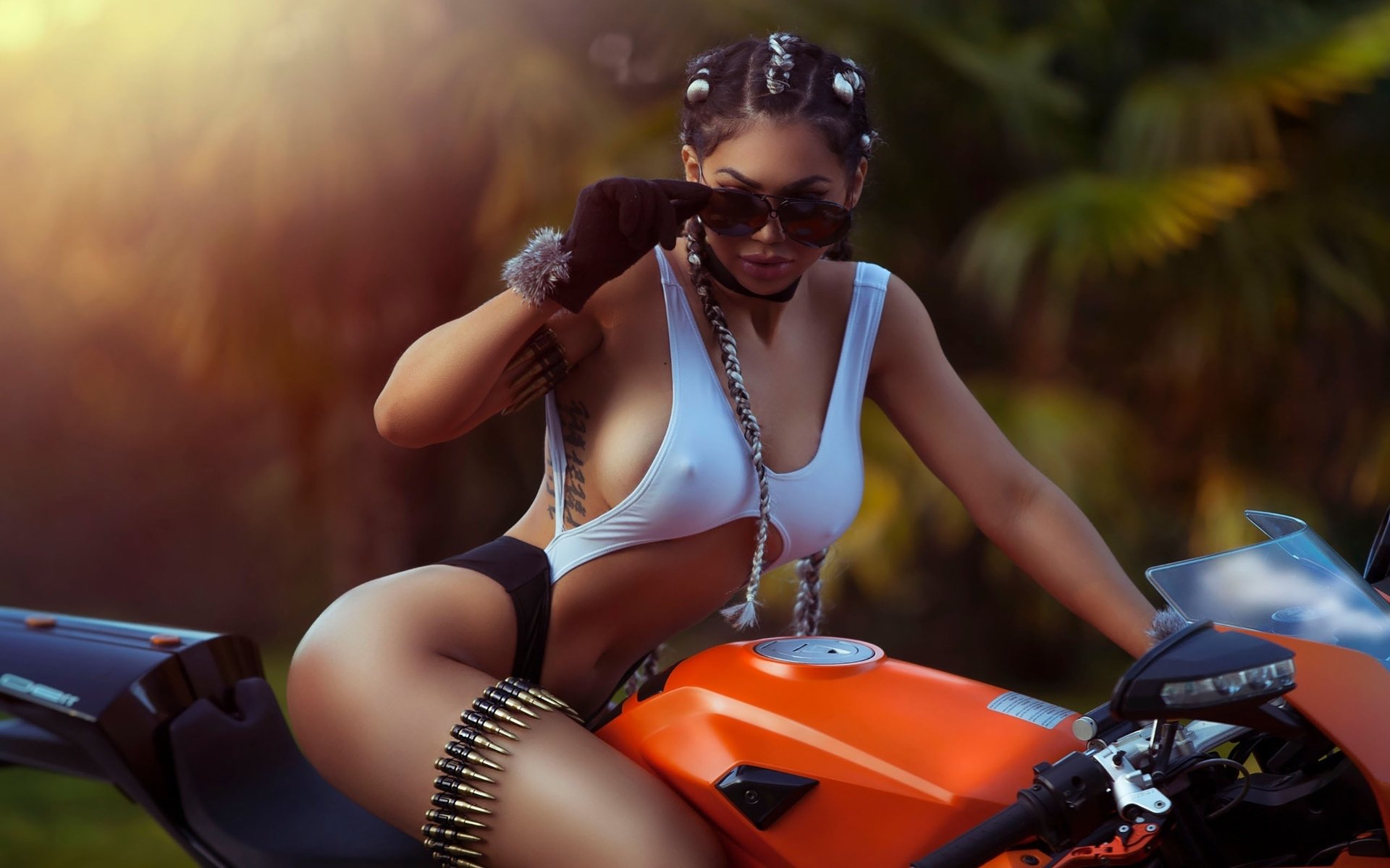 Girls with tattoos and motorcycles in Harare
